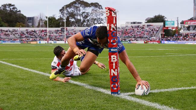 Bulldogs winger Reimis Smith scores a try against the Dragons. Picture: Brett Costello