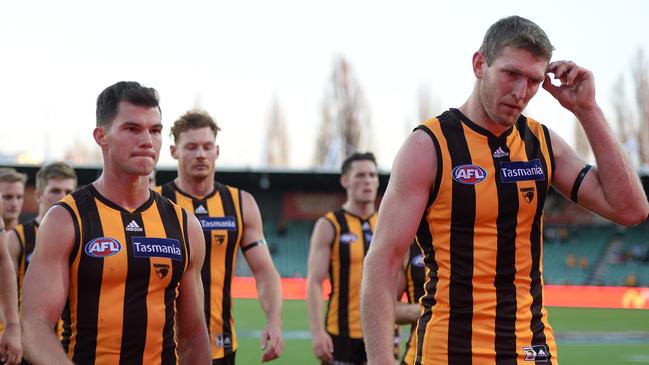 LAUNCESTON, AUSTRALIA - MAY 15: Ben McEvoy of the Hawks leads the team off the field after the loss during the round 9 AFL match between the Hawthorn Hawks and the North Melbourne Kangaroos at University of Tasmania Stadium on May 15, 2021 in Launceston, Australia. (Photo by Steve Bell/Getty Images)