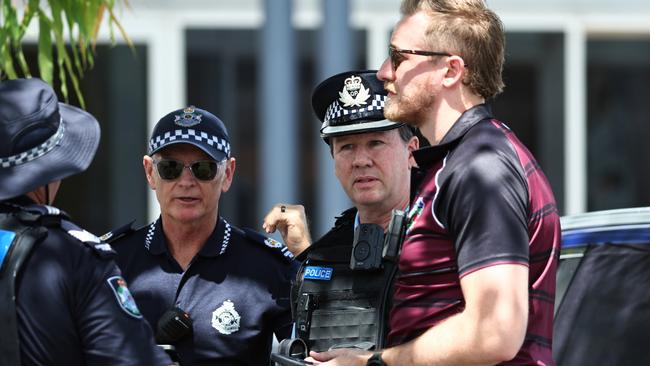 Emergency services personnel attend a scene at Cairns Central Shopping Centre, where a man scaled onto the awning of the centre and refused to come down. Police negotiators were called in to try and talk the man down from the roof. Picture: Brendan Radke
