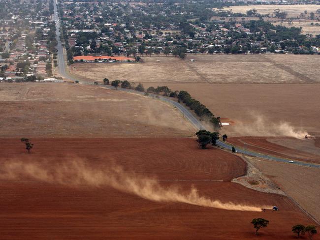 Land re-zoning. Melton. A farmer ploughs his fields near Melton South on land that may be eligible for rezoning under the Brumby Government plans.