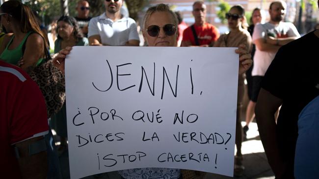 A supporter of Luis Rubiales holds a banner reading 'Jenni, why don't you tell the truth?' during a hunger strike by Rubiales' mother, in front of the Divina Pastora church in Motril last week. Picture: AFP