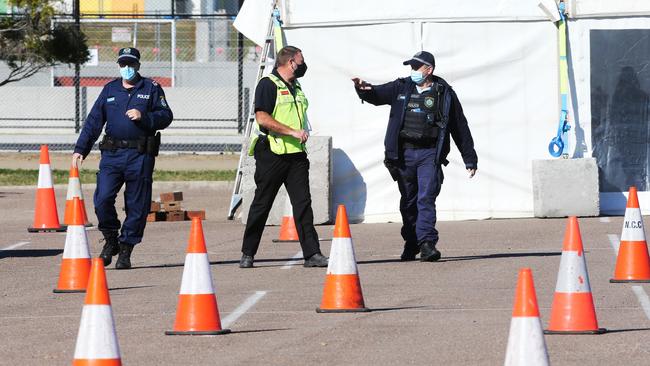 There was a heavy police presence at the new pop-up Covid testing centre at McDonald Jones Stadium in Newcastle on Day 1 of the lockdown on Friday. Picture: NCA NewsWire / Peter Lorimer.