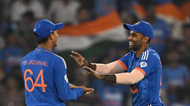 India's captain Suryakumar Yadav (R) and his teammate Yashasvi Jaiswal celebrate. (Photo by INDRANIL MUKHERJEE / AFP)