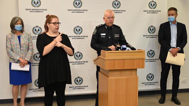 SA Health’s Professor Nicola Spurrier, Police Commissioner Grant Stevens (centre) and Education Department CEO Rick Persse. Picture: NCA NewsWire / Naomi Jellicoe