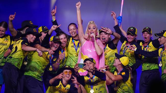 Jubilant Aussie cricketers celebrate on stage with Katy Perry after winning the T20 World Cup final. Picture: AAP Image/Scott Barbour