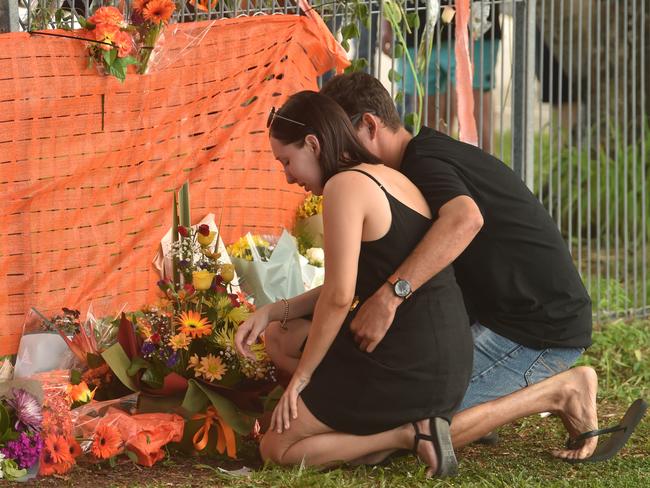 Mourners place flowers near the accident site. Picture: Evan Morgan