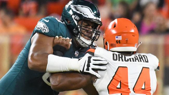 The Philadelphia Eagles’ Jordan Mailata engages Nate Orchard of the Cleveland Browns during a pre-season game last month. Picture: Getty Images