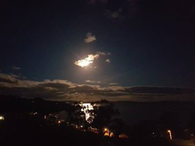 The supermoon seen from Kingston Beach. Reader’s picture: CHANTAL WOODHAMS