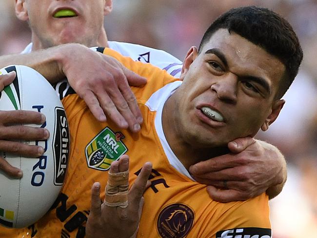 David Fafita of the Broncos is tackled by Daly Cherry-Evans of the Sea Eagles during the Round 25 NRL match between the Brisbane Broncos and the Manly-Warringah Sea Eagles at Suncorp Stadium in Brisbane, Sunday, September 2, 2018. (AAP Image/Dave Hunt) NO ARCHIVING, EDITORIAL USE ONLY