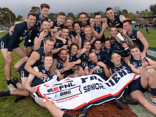 Berwick unfurl last year’s SEFNL flag. Picture: Chris Eastman/AAP