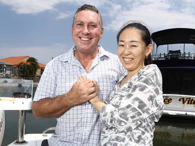 Gold Coast fishing stalwart Doug Burt has been struck down with an agressive form of prostate cancer.  Doug with his wife Misako Burt relax at their Runaway Bay home after Dougs operation. Picture Glenn Hampson