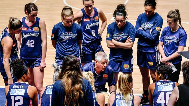 Adelaide Lightning players listen to coach Chris Lucas. Picture: MORGAN SETTE