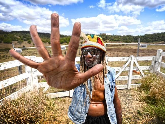 Robert Corowa protests at the site of the North Lismore Plateau development.