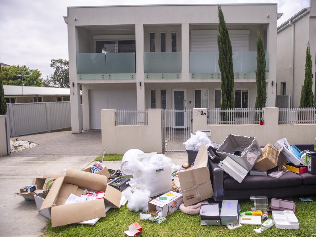 Ms Li’s mother emptied the house where her daughter lived yesterday and laid out her belongings on the street. Picture: Jeremy Piper