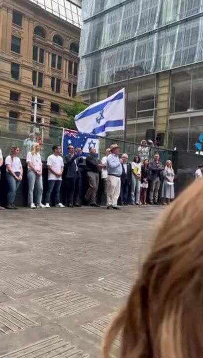 Businessman Michael Eason speaks at anti-Semitism rally