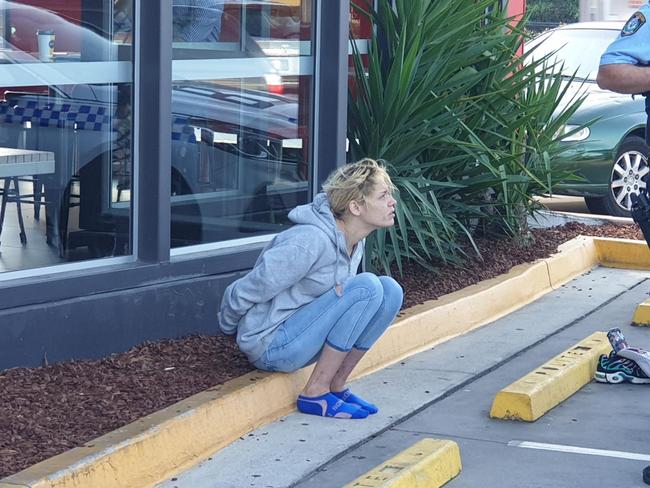 A woman was one of two people arrested at McDonald’s Lisarow. Picture: Top Notch Video