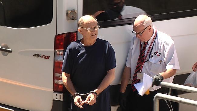 Domenic Perre being led into the Adelaide Magistrates Court. Picture: NINE NEWS