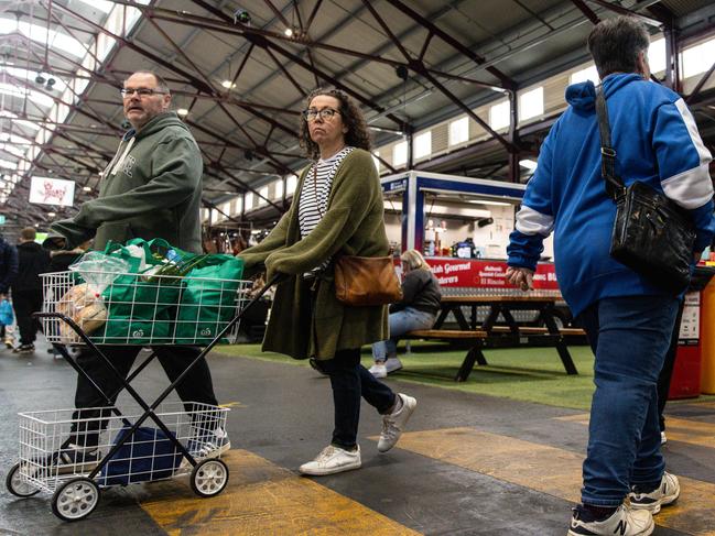 MELBOURNE, AUSTRALIA - NCA NewsWire Photos - 4 MAY 2024: Shoppers are seen at the Queen Victoria Market. Shopping, shops federal budget cost of living Picture: NCA NewsWire / Diego Fedele