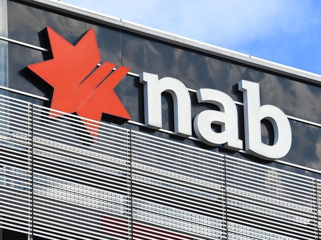 General view of NAB signage at the company's head office in Melbourne, Tuesday March 17, 2020. NAB employees have been evacuated from the head office following a staff member being confirmed as positive to coronavirus today. (AAP Image/James Ross) NO ARCHIVING