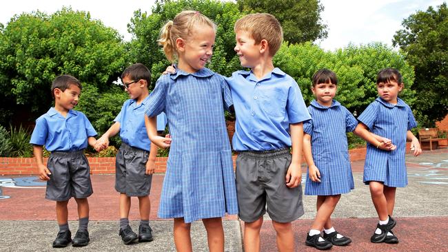 Three sets of twins started their school journey together on Thursday morning at Lake Munmorah Public School. Picture: Troy Snook