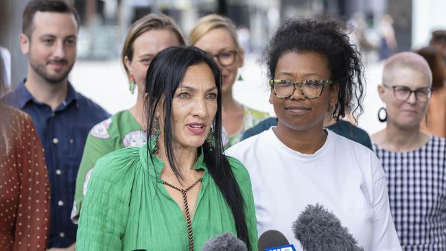 Greens candidate Seal Chong Wah outside Brisbane City Hall with The Gabba candidate Trina Massey (right). Picture: Richard Walker