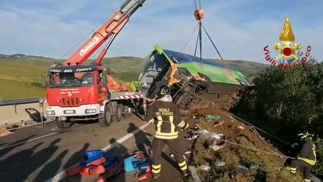 The bus wreck was lifted to a truck. Picture: Twitter