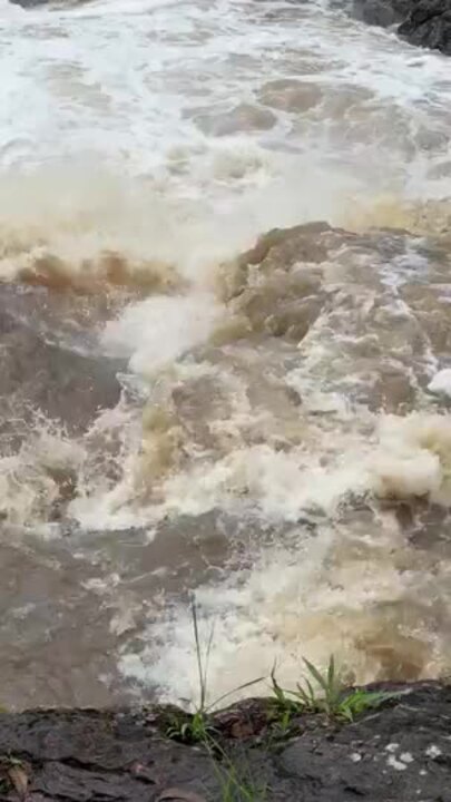 Roads closed, dams overflow as flooding hits