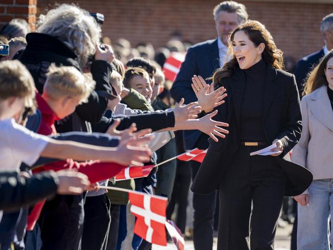 Queen Mary of Denmark is welcomed by students at Pilehaveskolen as she participates in the School Force visit. Picture: Getty Images