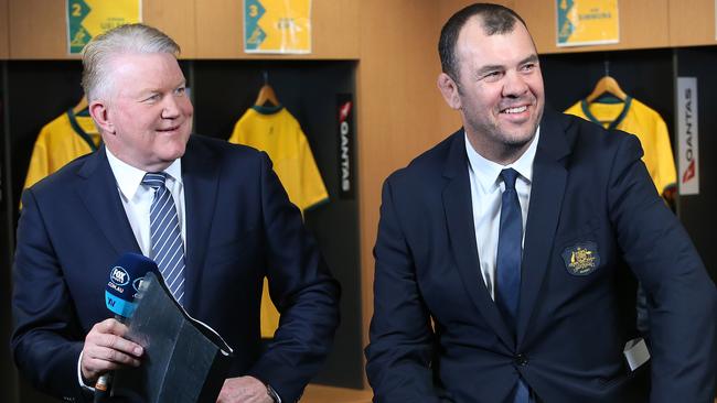 BRISBANE, AUSTRALIA — MAY 30: Wallabies coach Michael Cheika (right) announces players with Greg Clark from Fox Sports, during the Australia Wallabies squad announcement at Suncorp Stadium on May 30, 2018 in Brisbane, Australia. (Photo by Jono Searle/Getty Images)