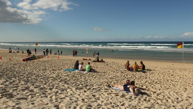 People enjoying themselves on Surfers paradise Beach. Picture Mike Batterham