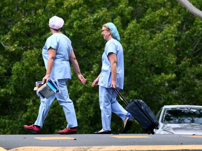 A worker at Dorothy Henderson Lodge in Macquarie Park, part of the Baptist Care Aged Care facility has tested positive to the Coronavirus and is now in isolation at North Shore hospital. Medical workers on the scene. Picture: Toby Zerna