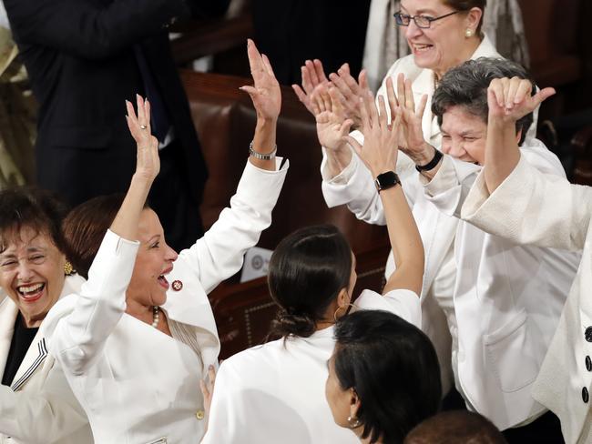 Members of Congress cheer after President Donald Trump acknowledges more women in Congress during his State of the Union address to a joint session of Congress on Capitol Hill in Washington, Tuesday, Feb. 5, 2019. (AP Photo/J. Scott Applewhite)
