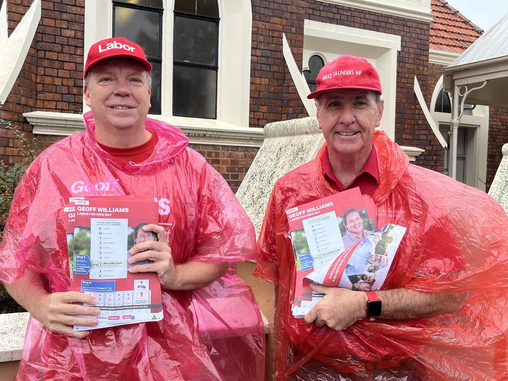 Labor state member for Maryborough Bruce Saunders handing out how-to-vote cards for Federal candidate Geoff Williams at St Paul's Memorial Hall.