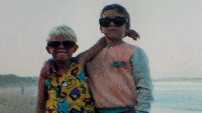 Mick Fanning (left) and brother Sean at the beach as kids.
