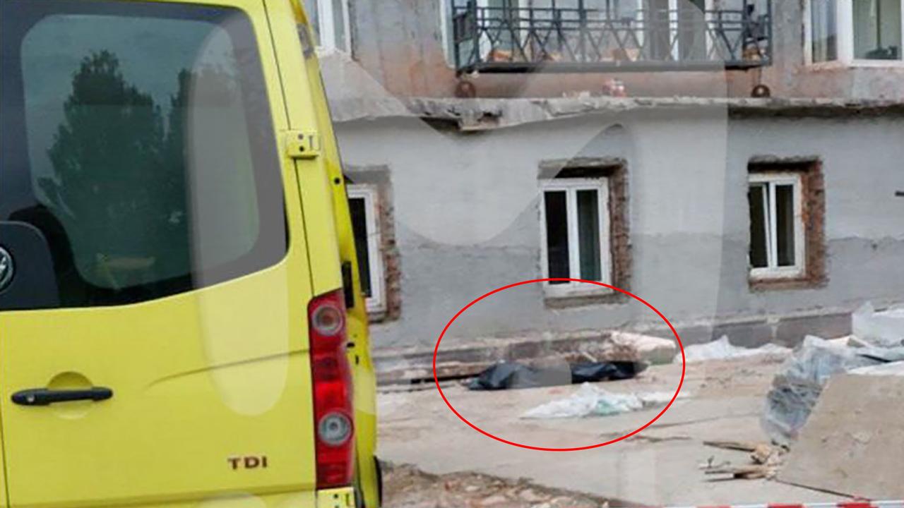 Maganov’s body is seen outside the hospital building