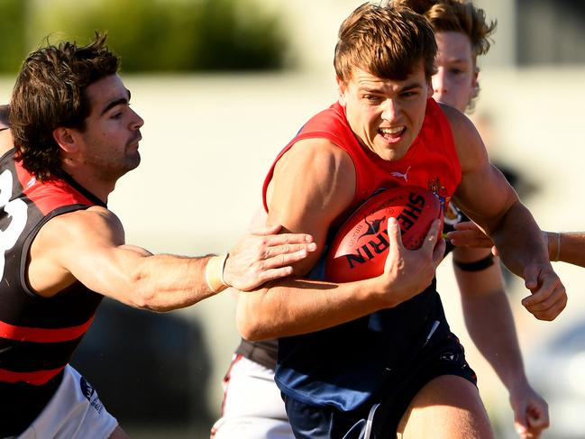 Harry Hynes of Old Brighton is tackled during the round nine 2023 Victorian Amateur Football Association William Buck Premier MenÃs match between Old Brighton and Old Xaverians at Brighton Beach Oval in Brighton, Victoria on June 17, 2023. (Photo by Josh Chadwick)