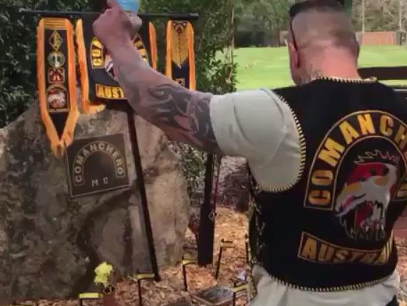 Comanchero members flock to the site to pay tributes to their fallen brothers.