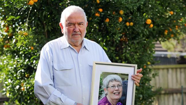 Sad farewell mired in farce … Geoff Kyngdon with a photo of his late wife Mary Lynne. Picture: Tim Hunter.