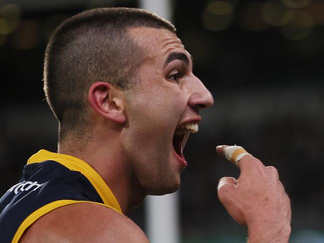 ADELAIDE, AUSTRALIA - AUG 17: Josh Rachele of the Crows gestures to the crowd after scoring a goal during the 2024 AFL Round 23 match between the port Adelaide Power and the Adelaide Crows at Adelaide Oval on August 17, 2024 in Adelaide, Australia. (Photo by James Elsby/AFL Photos via Getty Images)