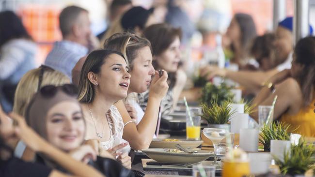 Busy restaurants, such as this on in Circular Quay in February,are set to become a common site again. Picture: NCA NewsWire / Jenny Evans