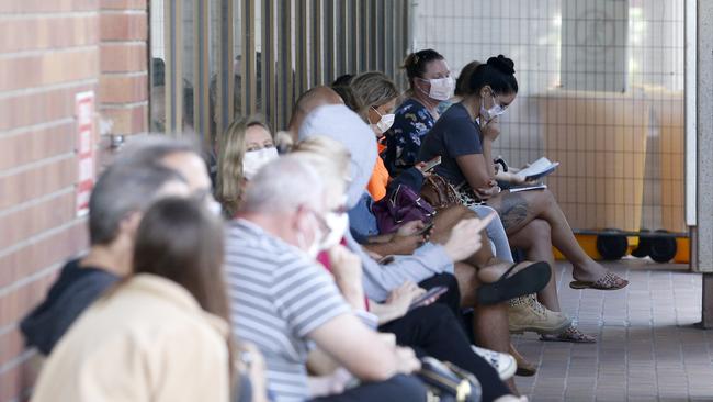 People attend a “fever clinic” at Redcliffe Hospital today. Picture: Steve Pohlner