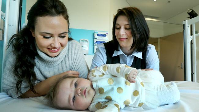 Pictured at the Gold Coast Private Hospital at Southport New Mum Leanne Fletcher and her 7-month-old Baby Emelia Butcher with paediatrics Unit nurse manager Emma Gerrard (on right) after attending their New bub settling course on offer at the Gold Coast Private hospital. Picture Mike Batterham