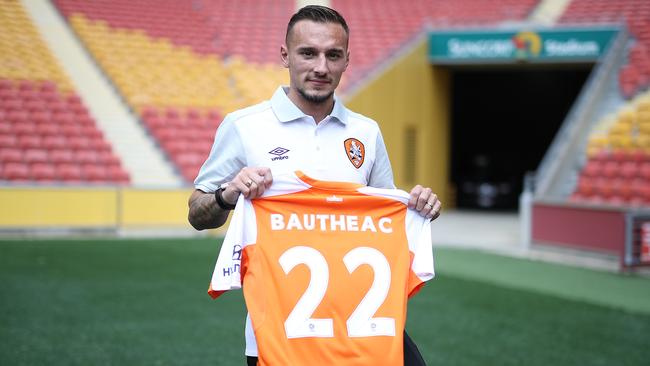 French player Eric Bautheac with the number 22 jersey he will wear for the Brisbane Roar.