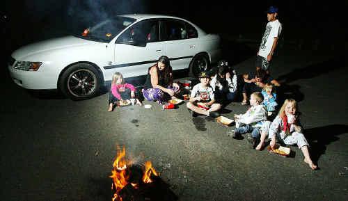 Sue-Anne Holland and her eight children spend the night in a Brassall park. Picture: Claudia Baxter