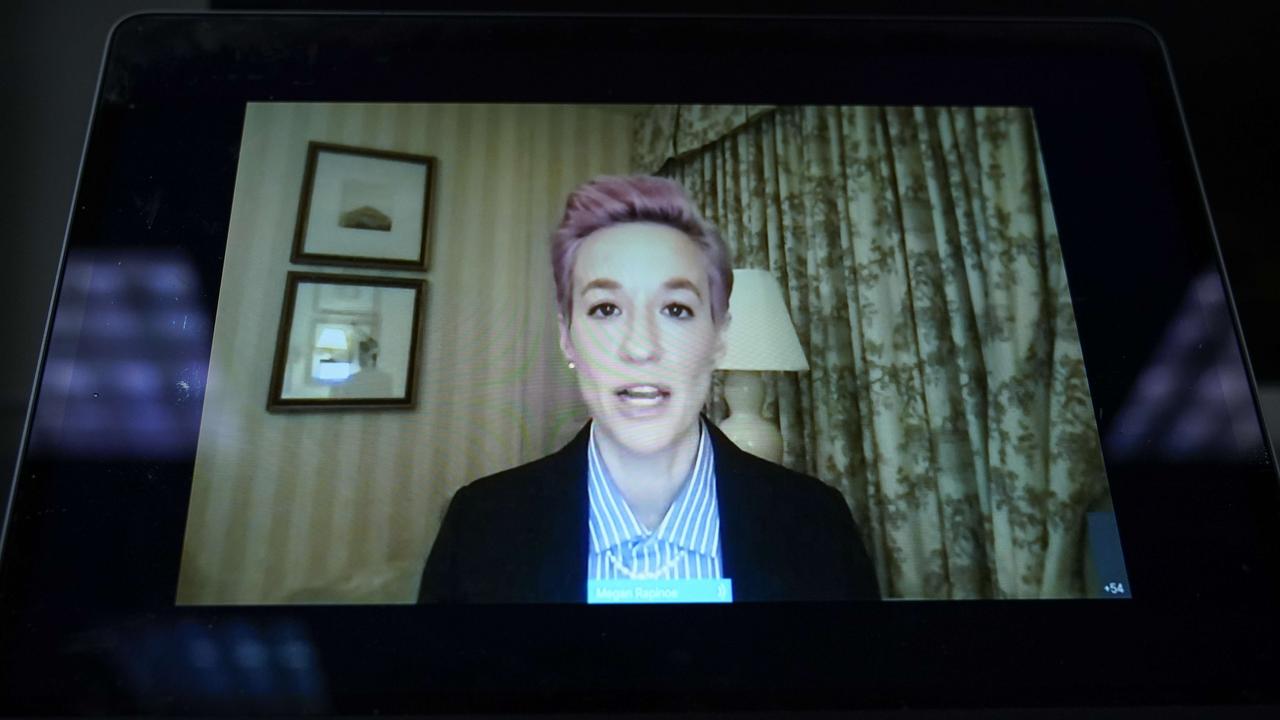 A screen shows Rapinoe testifying before the committee today. Picture: Drew Angerer/Getty Images/AFP