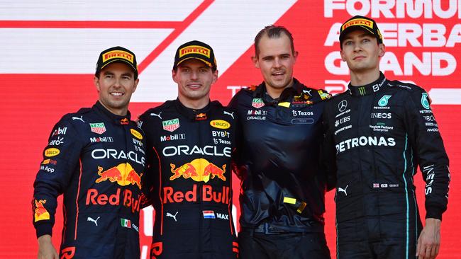 Race winner Max Verstappen, Sergio Perez and George Russell