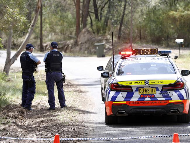 NOVEMBER 9, 2024: Police pictured at a road block on Wilton Park Road in Wilton. Police have established a crime scene in Sydney's south-west after the body of a teenage boy was located earlier today. Emergency services responded to reports about 7.25am (Saturday 9 November 2024), that a body had been located in bushland off Wilton Park Road, Wilton.Picture: Damian Shaw