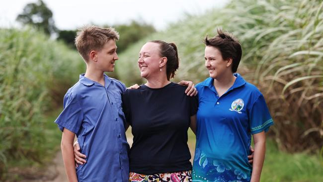 “Whatever life throws at us, we deal with it together,” Ms Allen said, alongside children Tobias, 13 and Pluto, 17. Picture: Brendan Radke
