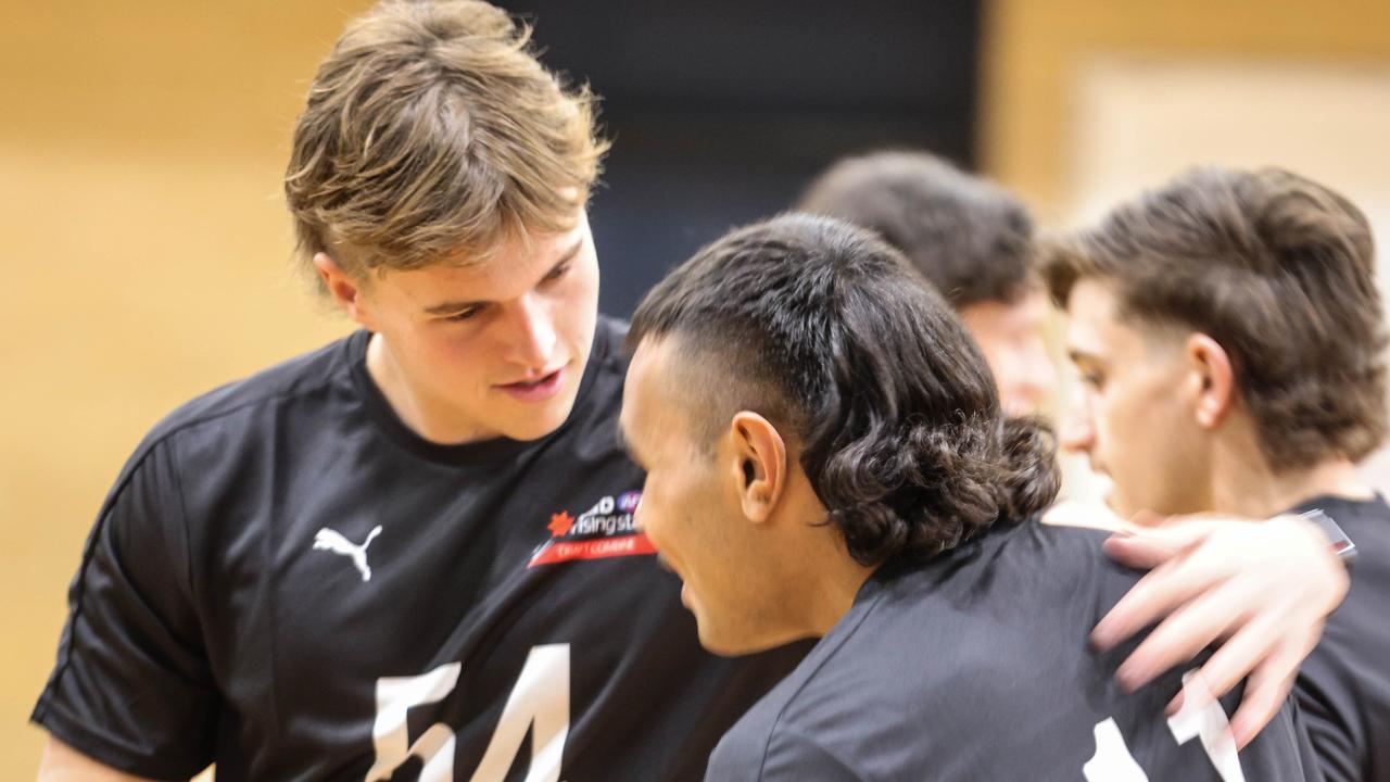 Zac Becker with Blayne O’Loughlin at the combine. Picture: Russell Millard