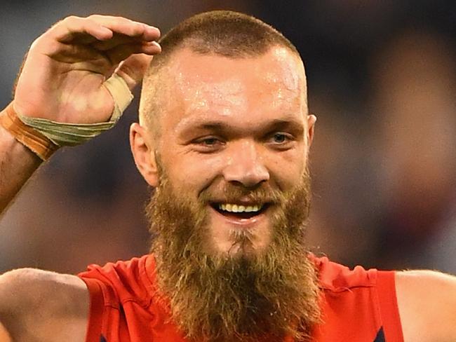 MELBOURNE, AUSTRALIA - APRIL 17: Max Gawn of the Demons is congratulated by Jack Viney after kicking a goal during the round four AFL match between the Collingwood Magpies and the Melbourne Demons at Melbourne Cricket Ground on April 17, 2016 in Melbourne, Australia. (Photo by Quinn Rooney/Getty Images)